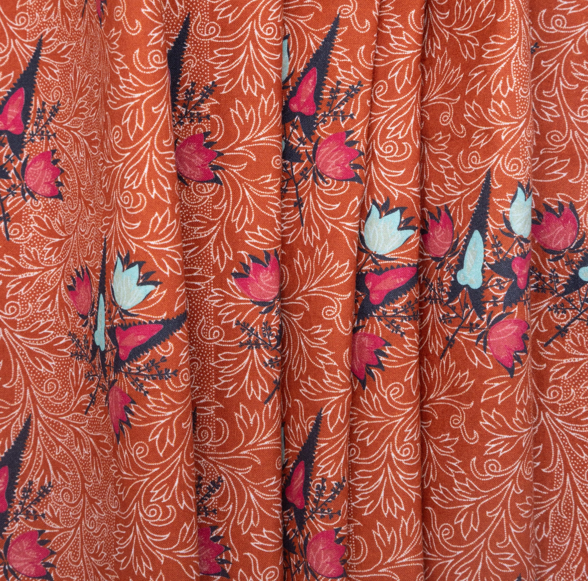 Pumpkin Ground Filigree & Flower'd Cotton, drape -  $25.00 yd. -Burnley & Trowbridge Co.
