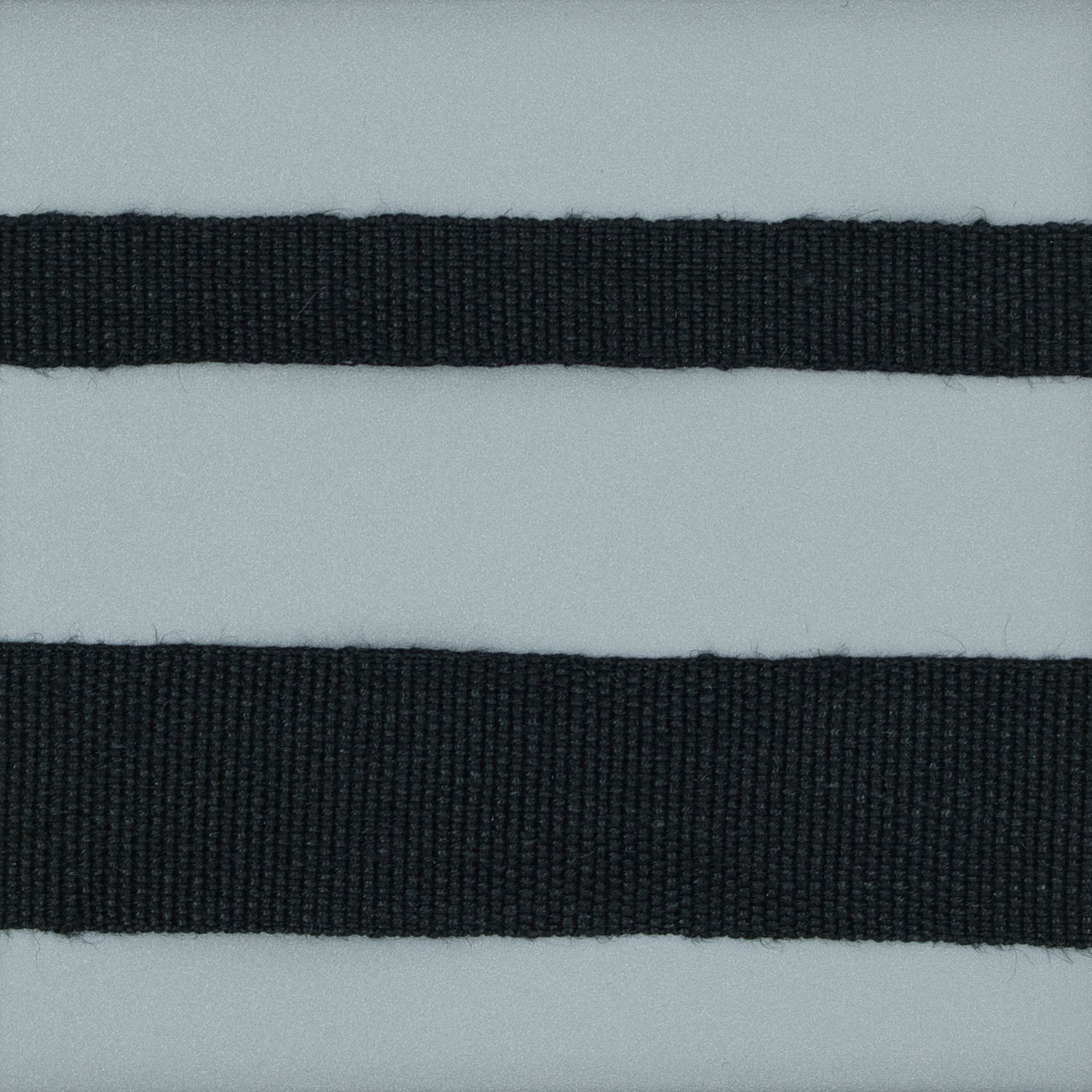 Black linen plain weave tape in 3/8 and 3/4 inch