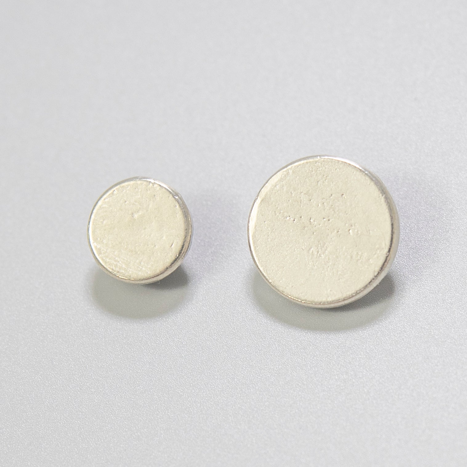 Flat Pewter Button - $.80 - $.90 - Burnley & Trowbridge Co.