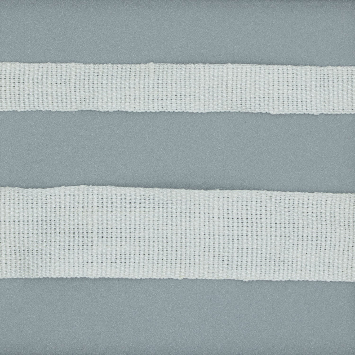 White linen plain weave tape in 3/8 and 3/4 inch